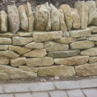 Finished low rise stone wall, Buckinghamshire