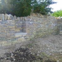 Dry stone walling seat feature
